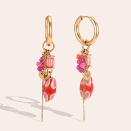 Oorbellen stainless steel goud met roze kralen