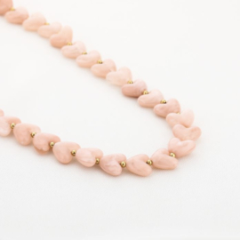 Set van ketting en armband met hartjes kralen roze