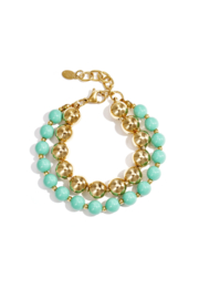 Dubbele armband kralen groen en bolletjes goud