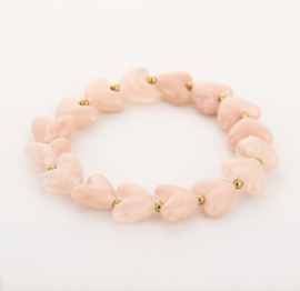 Set van ketting en armband met hartjes kralen roze