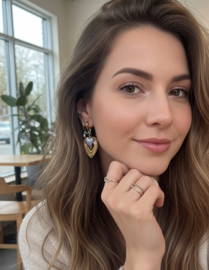 Oorbellen stainless steel goud met bedel hart en blauwe kraal