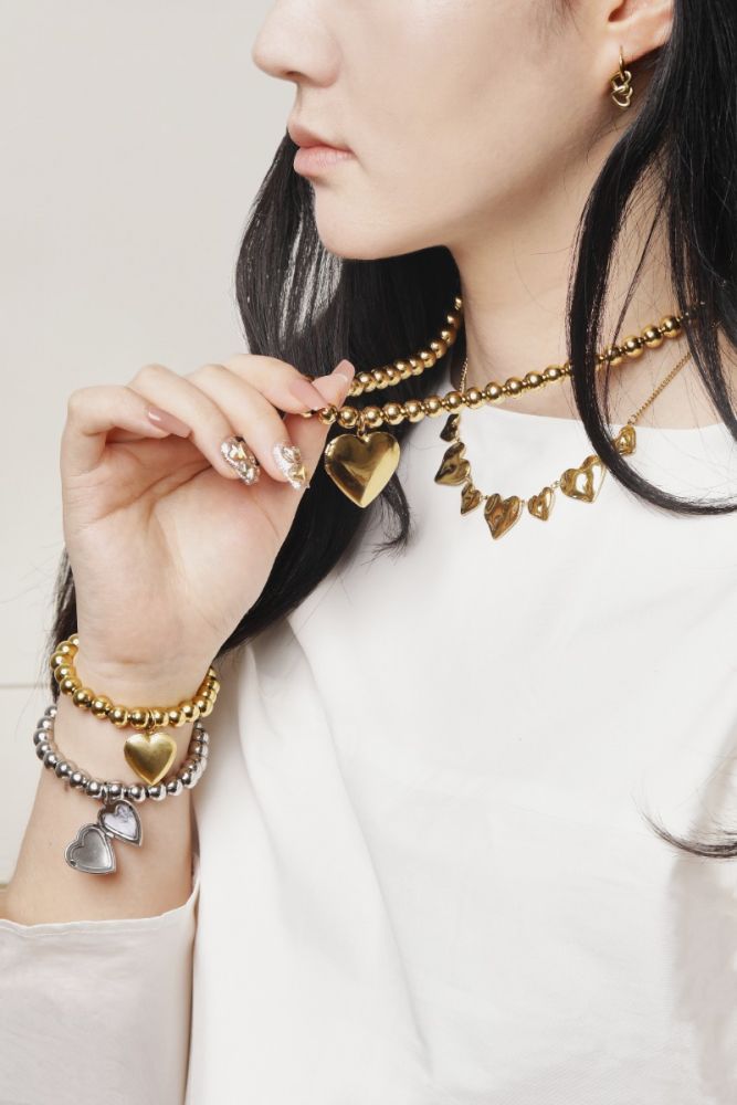 Statement ketting balletjes en hart goud