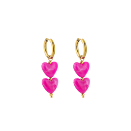 Stainless steel oorbellen goud met hartjes fushia