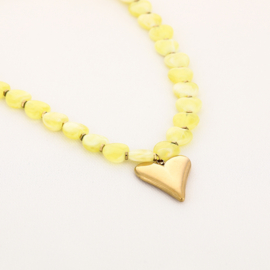 Ketting met kralen geel en goud hartje