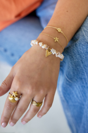 Kralenarmband hartje beige