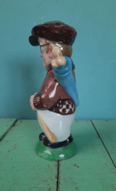 drankfles in de vorm van een golfer - ca. 1930