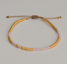 Kralenarmband | goud roze