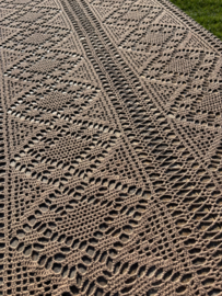 Opvallend licht bruine sprei