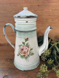 Gebloemde koffiepot met opstand