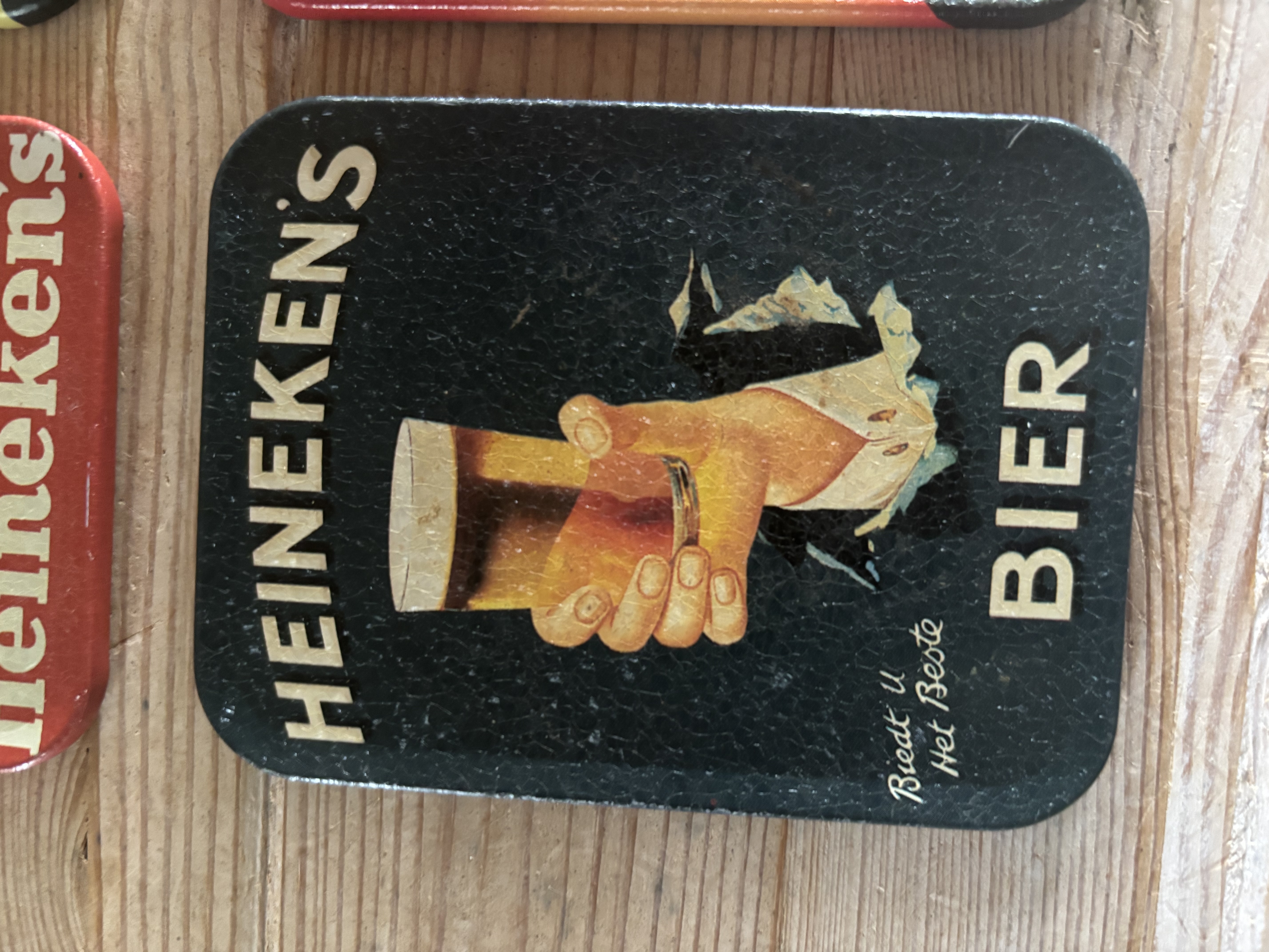 (Verkocht)Heineken oude onderzetters blik
