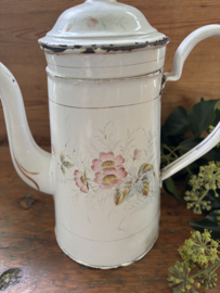 Gebloemde koffiepot met opstand