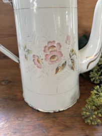 Gebloemde koffiepot met opstand