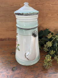 Gebloemde koffiepot met opstand