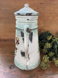 Gebloemde koffiepot met opstand
