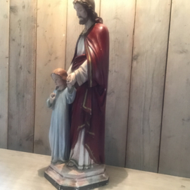 Groot Jesus beeld met kind
