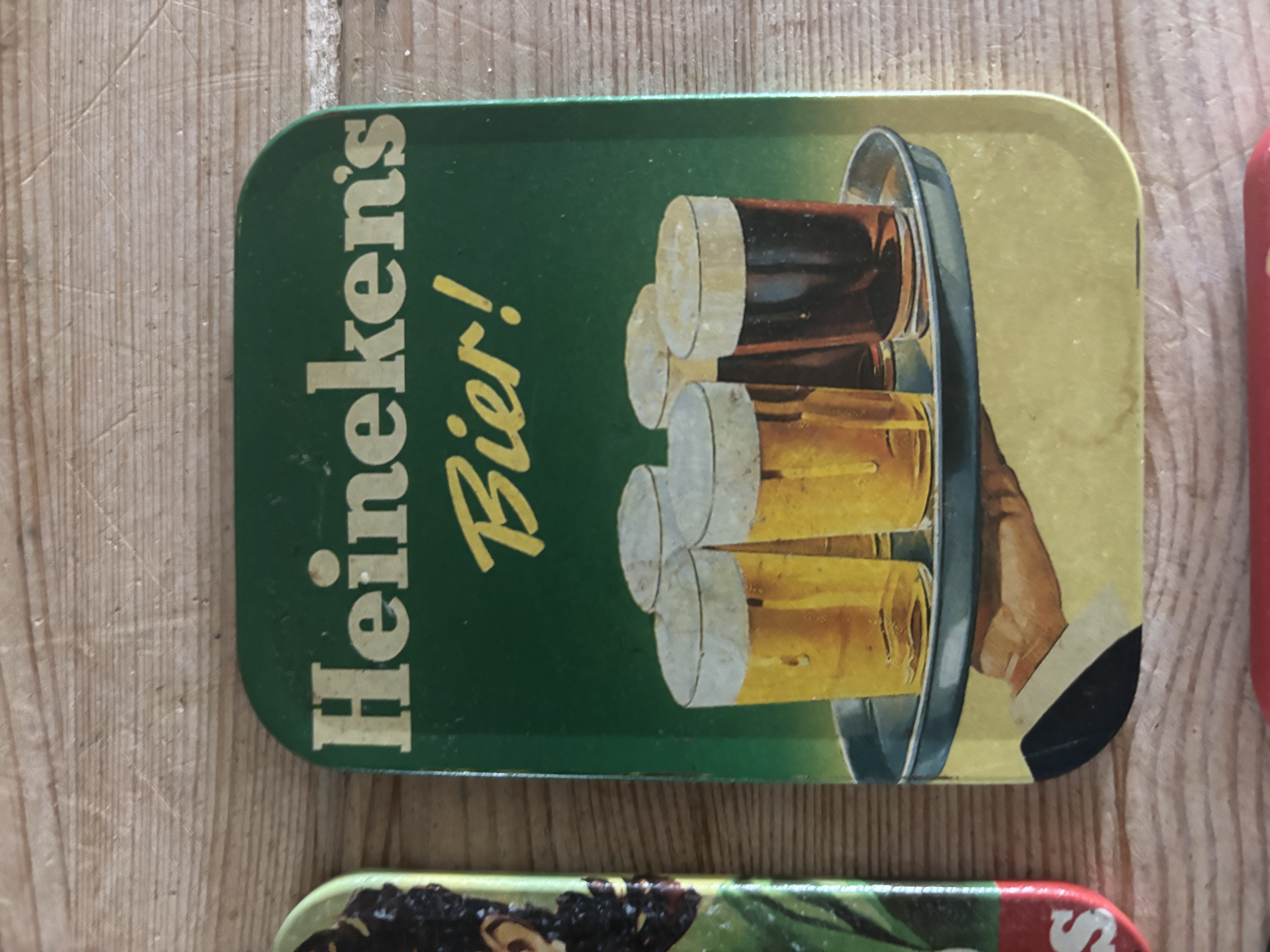 (Verkocht)Heineken oude onderzetters blik
