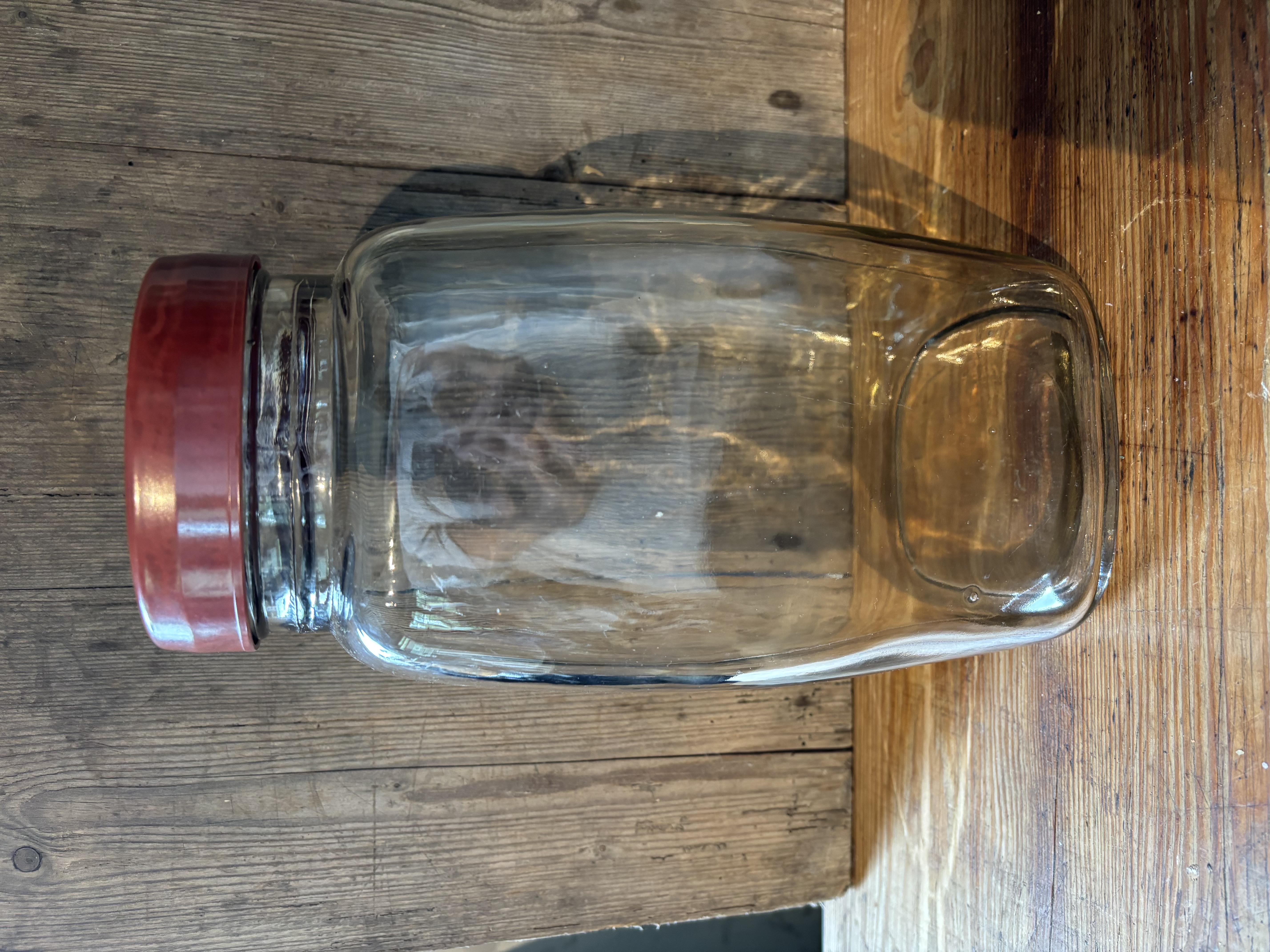 Glazen voorraadpot met bakelieten deksel