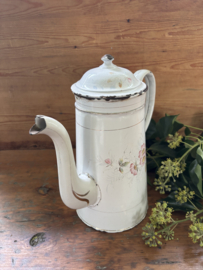 Gebloemde koffiepot met opstand