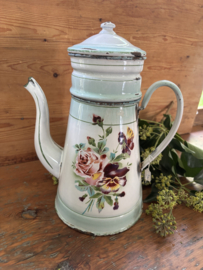 Gebloemde koffiepot met opstand