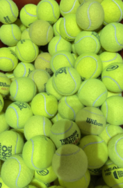 12 balles de tennis usagées