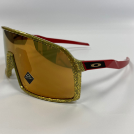 Oakley Sutro - Gold sparkle / Red