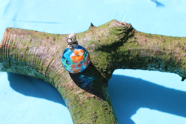 turquoise bol met oranje bloemen