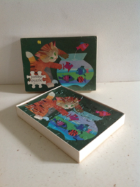 Puzzel. Kat en viskom.