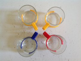 Theeglas. 70’s Rood handvat.
