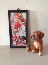 Decoratie. Meisje met rode haarband en hondje.