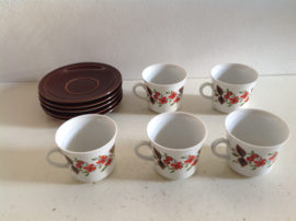 Kop en schotels. Set van 5 stuks.