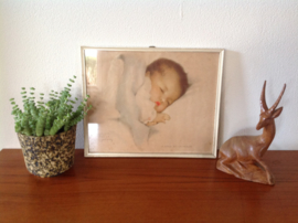 Wanddecoratie. Slapende baby.