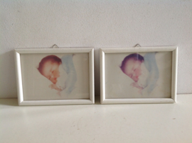 Wanddecoratie. Baby slapend.