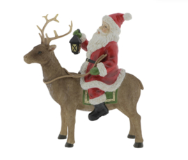Kerstman op rendier