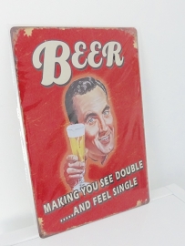 Tekstbord "Beer makes you.."