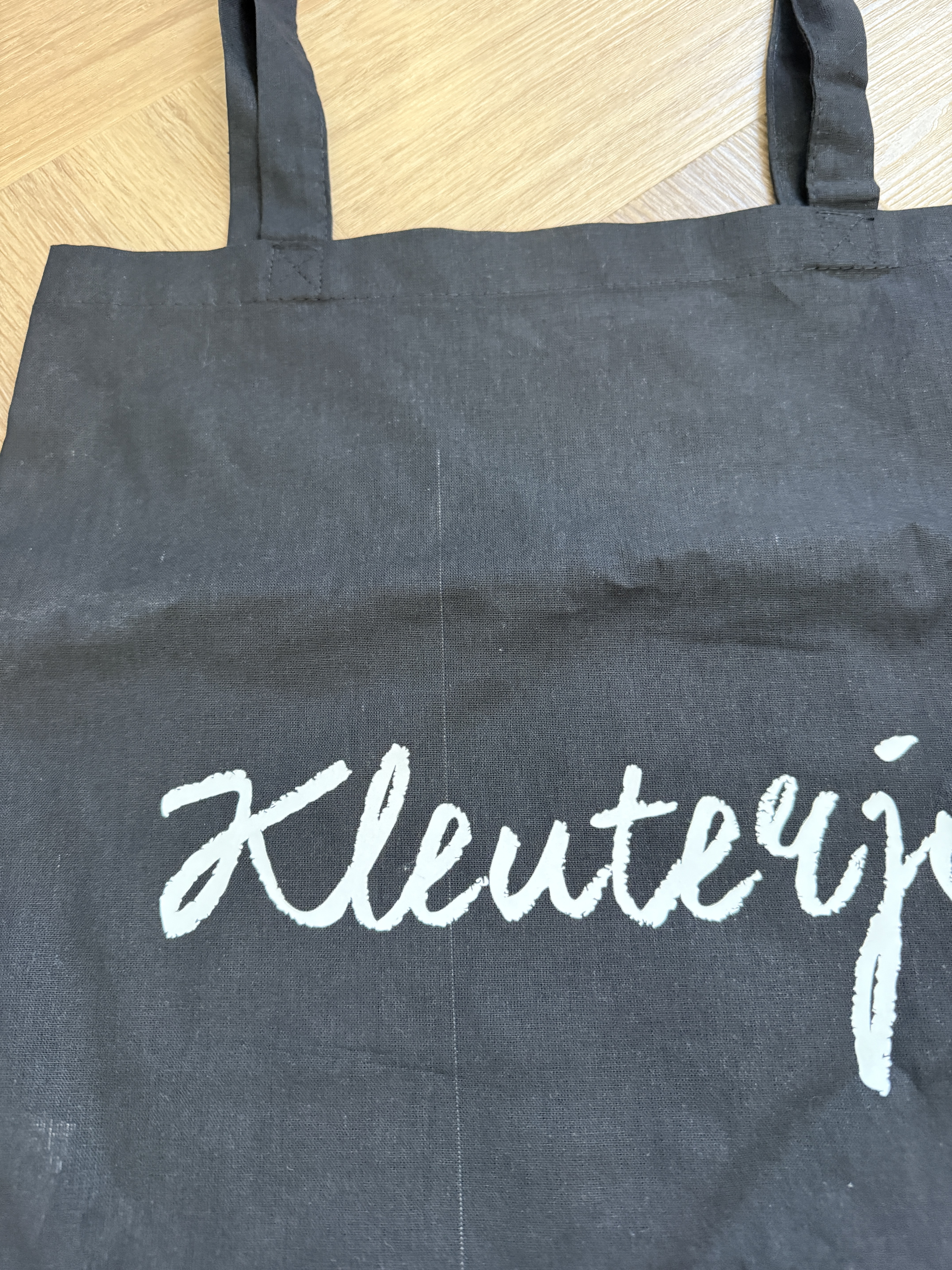 Tweedekansje: Zwart KLEUTERJUF. katoenen tas (Enkelzijdig)