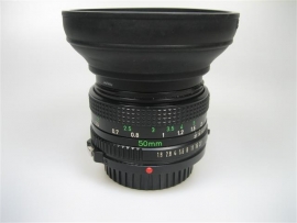 Canon Lens-FD50 mm 1 : 1.8 met zonkap