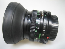 Canon Lens-FD50 mm 1 : 1.8 met zonkap