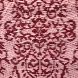 Plastic vloerkleed, kleurrijk motief, 60 x 120 cm.