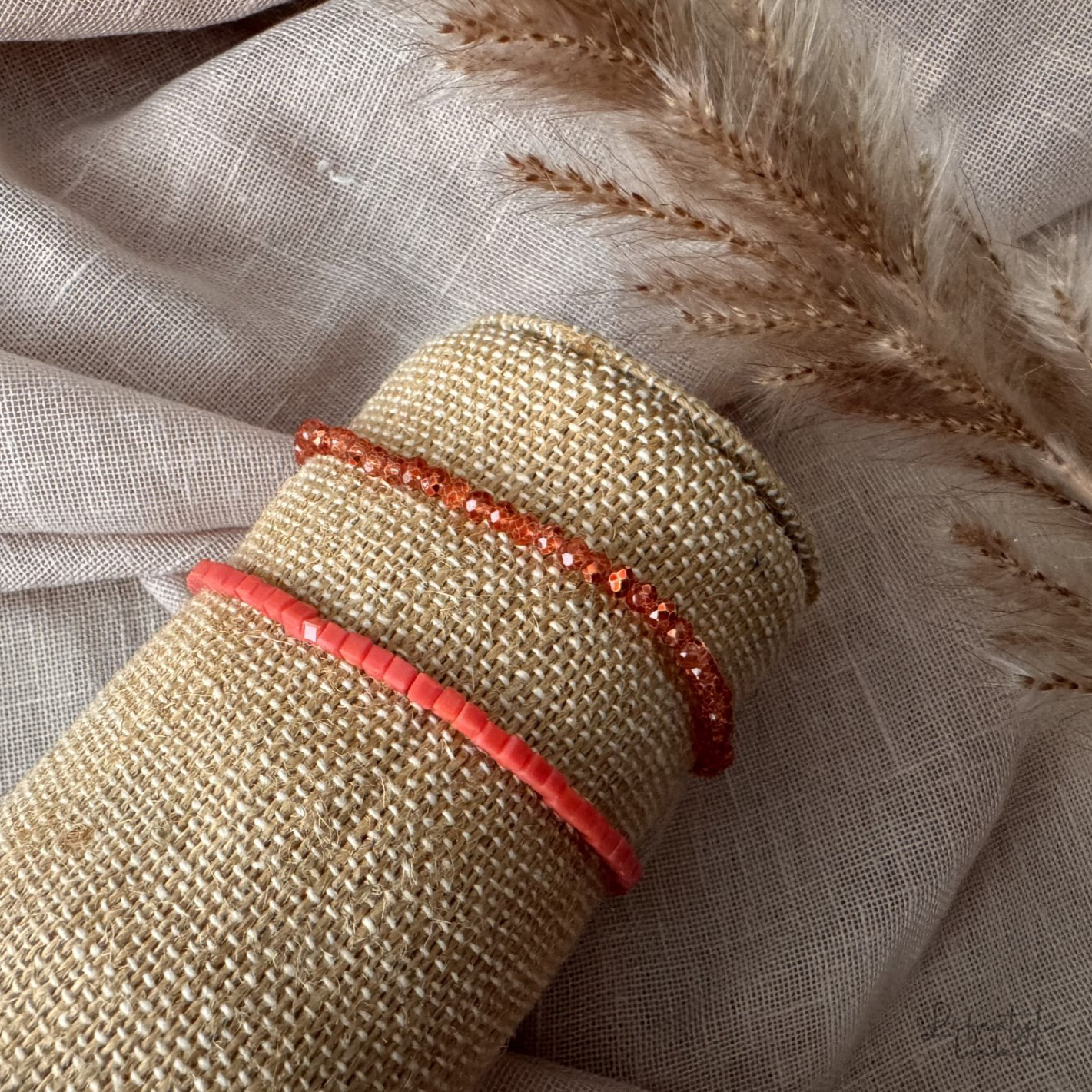 Sprankelende kralen armbandjes roze/oranje
