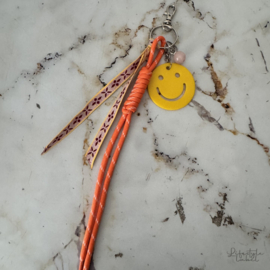 Sleutel/tassen hanger smile geel