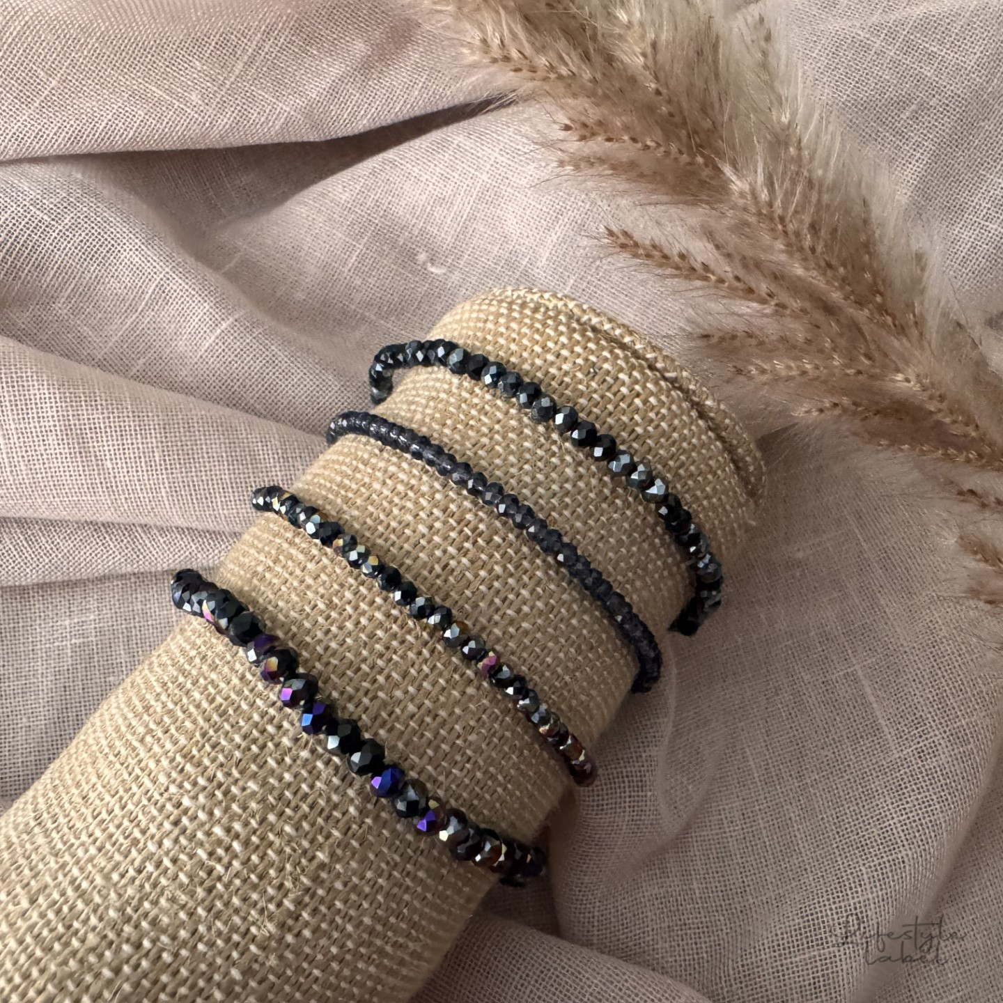 Sprankelende kralen armbandjes paars/zwart