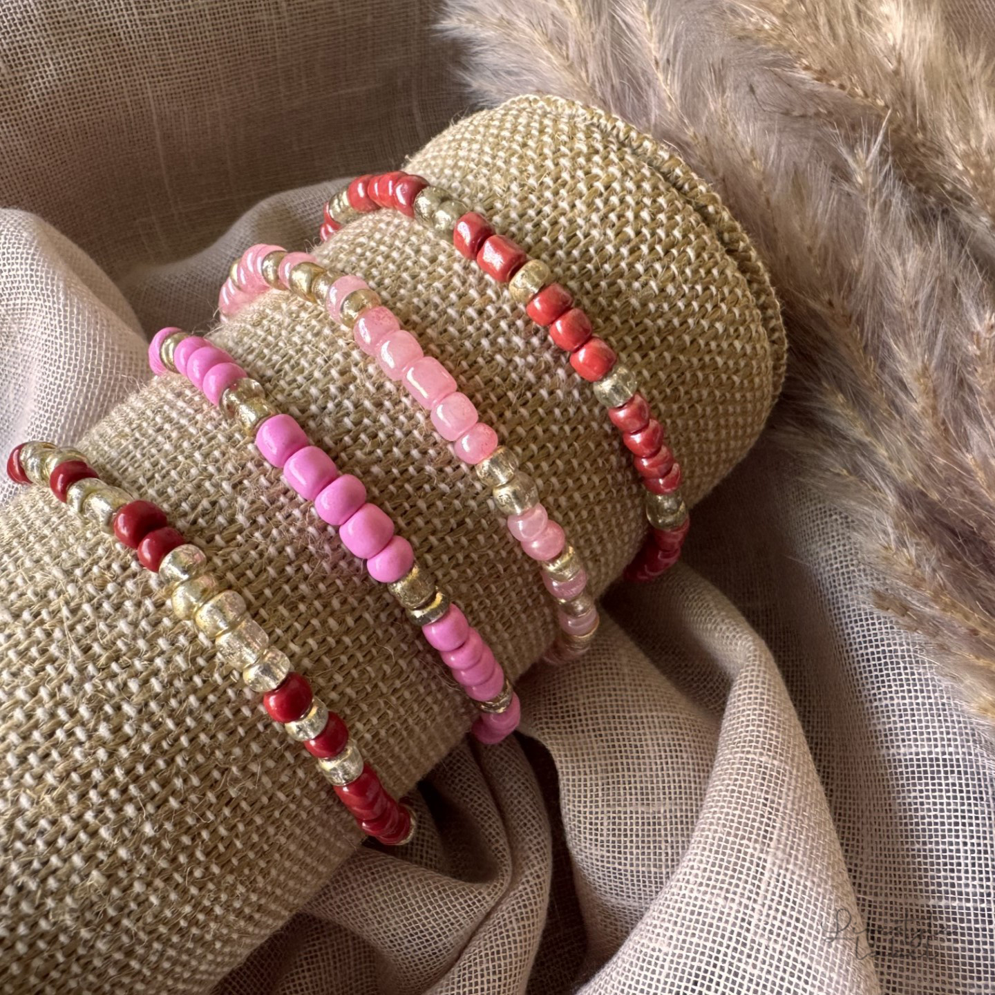 Kralen armbandjes rood/roze