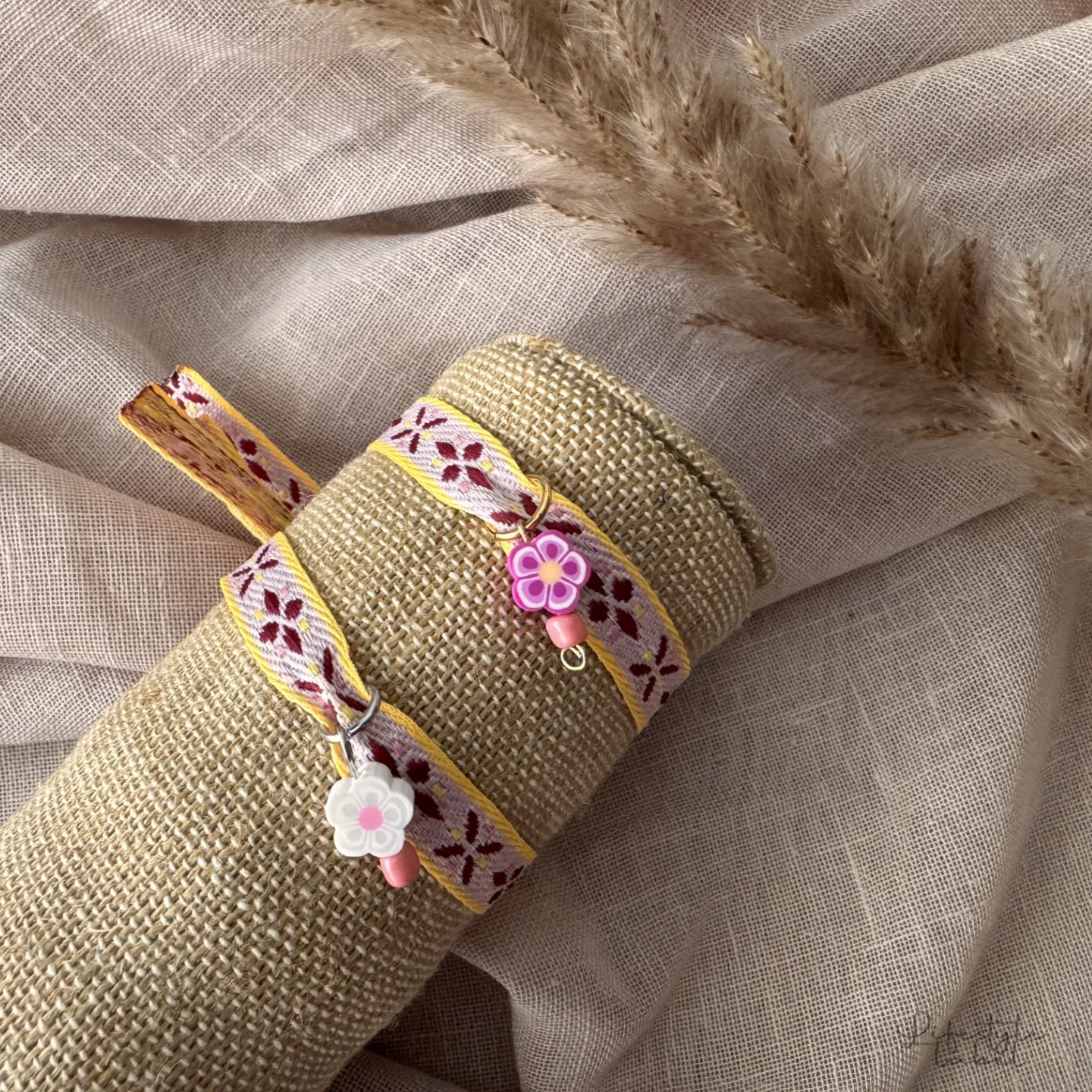 Lintarmband roze/geel