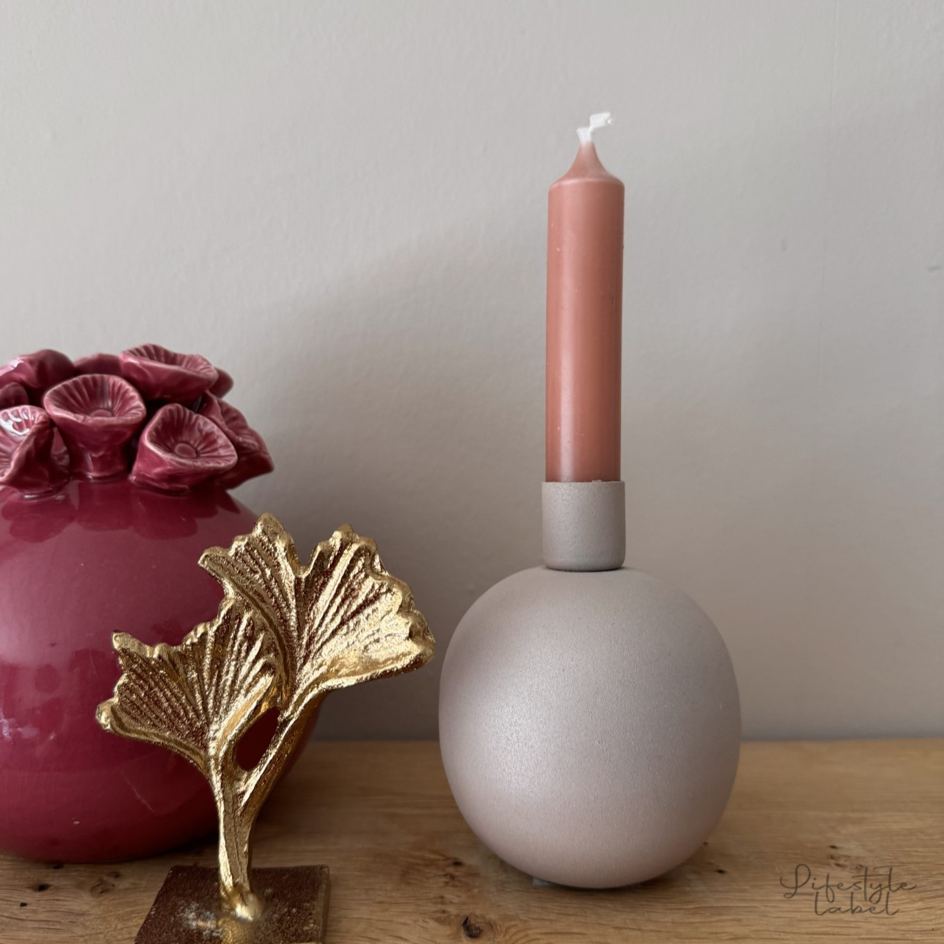 Kaarsenkandelaar bol licht roze