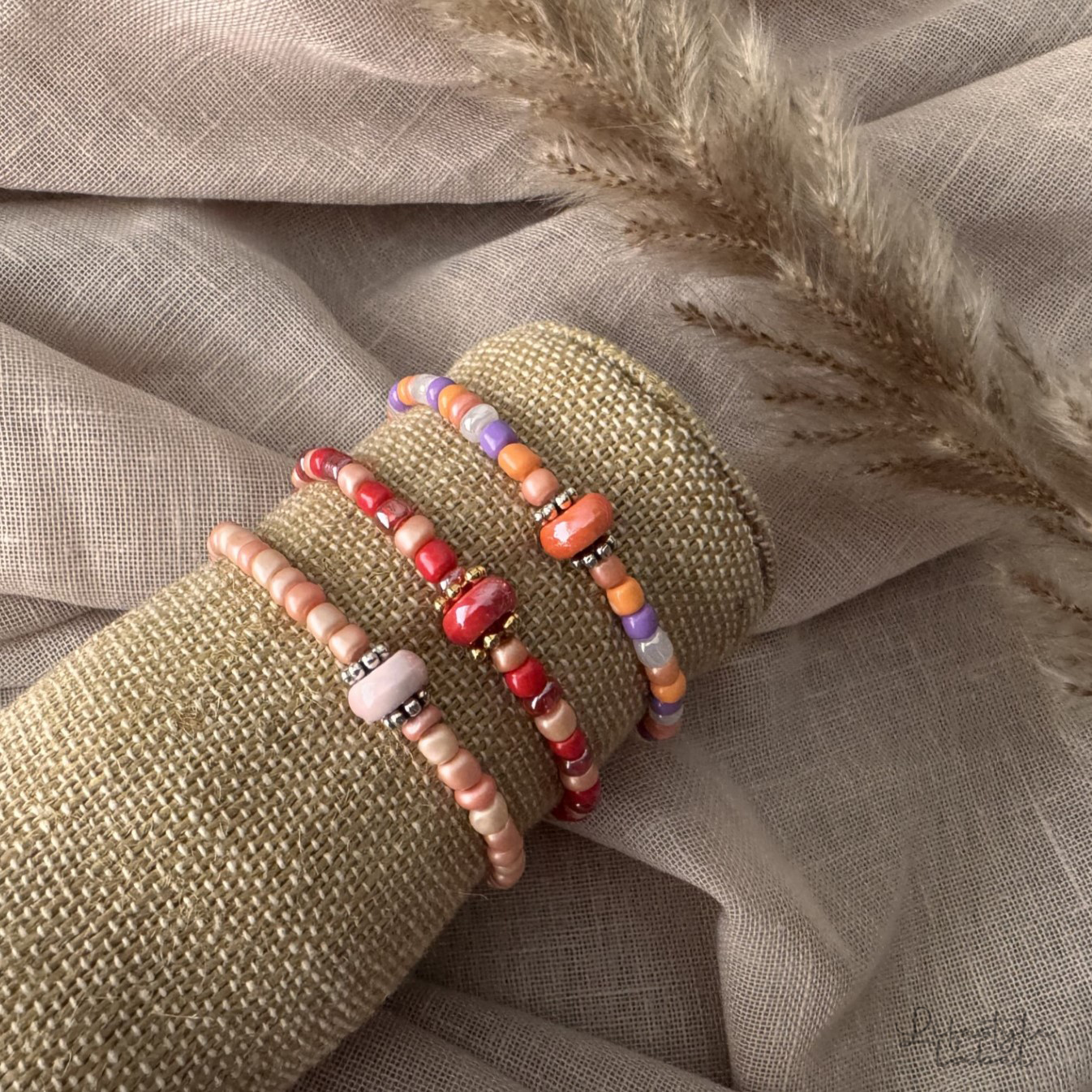 Kralen armbandjes roze/oranje