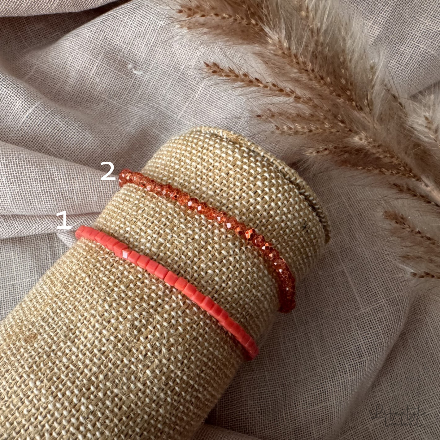 Sprankelende kralen armbandjes roze/oranje