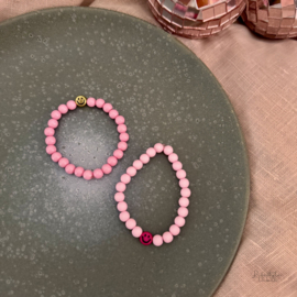 Meiden armbandje roze