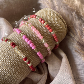 Kralen armbandjes rood/roze