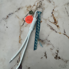 Sleutel/tassen hanger smile oranje/blauw