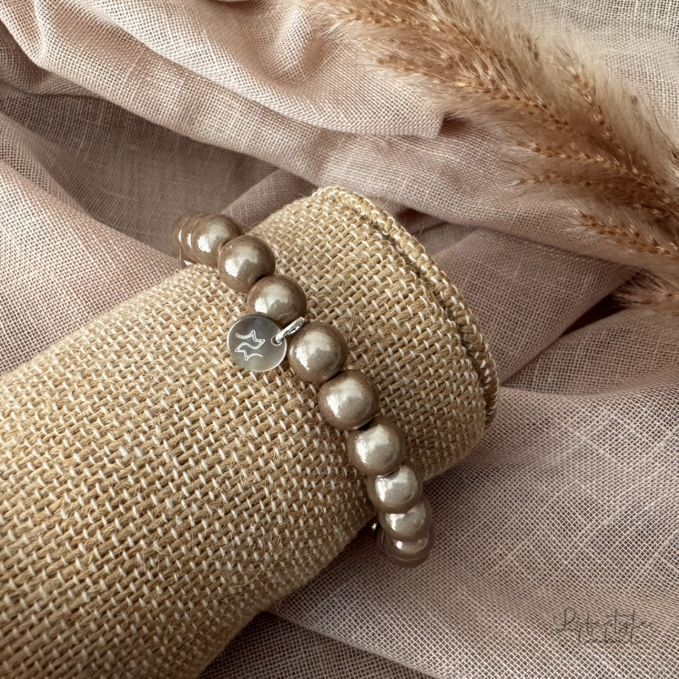 Dames kralenarmband bruin